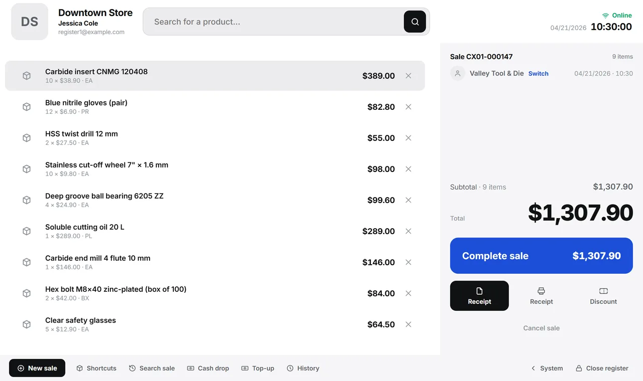 The Downtown Store register with a nine-item sale in progress, the $1,307.90 total, the finish button and the register shortcuts in the bottom bar.
